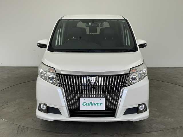 トヨタ エスクァイア Gi 兵庫県 2015(平27)年 7.6万km ホワイトパールクリスタルシャイン ・純正9インチSDナビ＆フルセグ＆BT＆DV/・バックカメラ/・両側パワースライドドア/・ビルトインETC/・社外前方ドライブレコーダー/・合皮シート/・前席シートヒーター/・革巻きステアリング/・ステアリングリモコン/・LEDヘッドライト/・フォグ/・オートライト/・オートマチックハイビーム/・2列目サンシェード/・クルーズコントロール/・スマートキー/・プッシュスタート/・純正15インチアルミホイール/・横滑り防止装置/・アイドリングストップ/・純正フロアマット