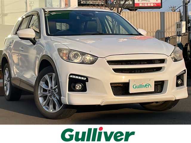 マツダ ＣＸ－５ XD Lパッケージ 道央・札幌 2012(平24)年 10.2万km クリスタルホワイトパールマイカ ・４WD/・衝突軽減ブレーキ/・ディーゼルターボ/・社外オーディオ/　CD＆DVD＆BT/・バックカメラ/・レザーシート/・シートヒーター/・パワーシート/・オートエアコン/・オートライト/・レインセンサーワイパー/・オートリトラミラー/・アイドリングストップ/・MT付きAT/・ETC/・純正エンジンスターター/・プッシュスタート/・スマートキー/・HIDヘッドライト/・クルーズコントロール/・ドライブレコーダー/・純正フロアマット/・ドアバイザー/・ウィンカーミラー/・フォグライト
