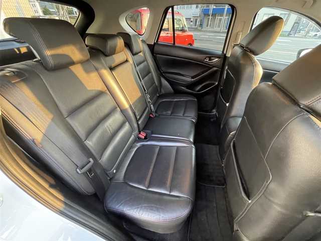 マツダ ＣＸ－５ XD Lパッケージ 道央・札幌 2012(平24)年 10.2万km クリスタルホワイトパールマイカ ・４WD/・衝突軽減ブレーキ/・ディーゼルターボ/・社外オーディオ/　CD＆DVD＆BT/・バックカメラ/・レザーシート/・シートヒーター/・パワーシート/・オートエアコン/・オートライト/・レインセンサーワイパー/・オートリトラミラー/・アイドリングストップ/・MT付きAT/・ETC/・純正エンジンスターター/・プッシュスタート/・スマートキー/・HIDヘッドライト/・クルーズコントロール/・ドライブレコーダー/・純正フロアマット/・ドアバイザー/・ウィンカーミラー/・フォグライト