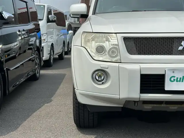 三菱 パジェロ ロング エクシード 広島県 2010(平22)年 17.4万km ウォームホワイトパール パートタイム4WD/社外ナビ/「CD/DVD/Bluetooth/フルセグTV」/SOREXヒッチメンバー/バックカメラ/シートヒーター/ETC/ドライブレコーダー/センターインフォメーションディスプレイ/オートライト/スペアキー