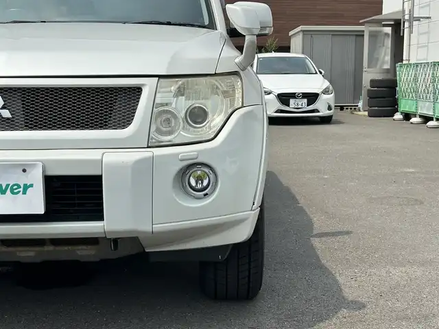 三菱 パジェロ ロング エクシード 広島県 2010(平22)年 17.4万km ウォームホワイトパール パートタイム4WD/社外ナビ/「CD/DVD/Bluetooth/フルセグTV」/SOREXヒッチメンバー/バックカメラ/シートヒーター/ETC/ドライブレコーダー/センターインフォメーションディスプレイ/オートライト/スペアキー