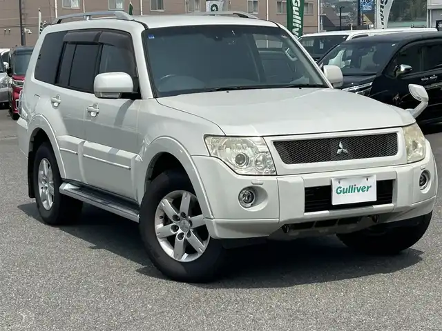 三菱 パジェロ ロング エクシード 広島県 2010(平22)年 17.4万km ウォームホワイトパール パートタイム4WD/社外ナビ/「CD/DVD/Bluetooth/フルセグTV」/SOREXヒッチメンバー/バックカメラ/シートヒーター/ETC/ドライブレコーダー/センターインフォメーションディスプレイ/オートライト/スペアキー