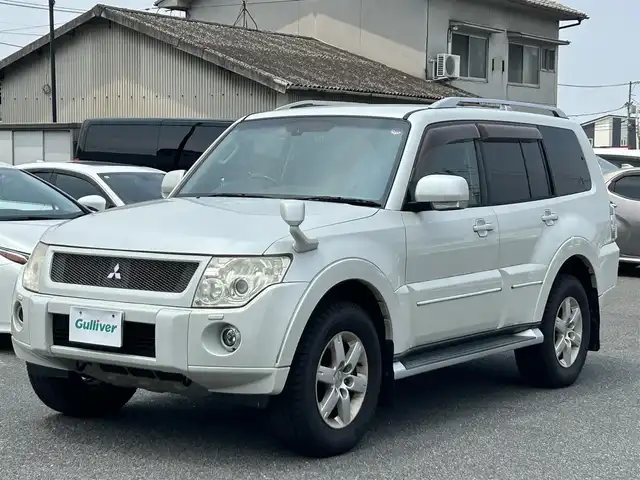 三菱 パジェロ ロング エクシード 広島県 2010(平22)年 17.4万km ウォームホワイトパール パートタイム4WD/社外ナビ/「CD/DVD/Bluetooth/フルセグTV」/SOREXヒッチメンバー/バックカメラ/シートヒーター/ETC/ドライブレコーダー/センターインフォメーションディスプレイ/オートライト/スペアキー