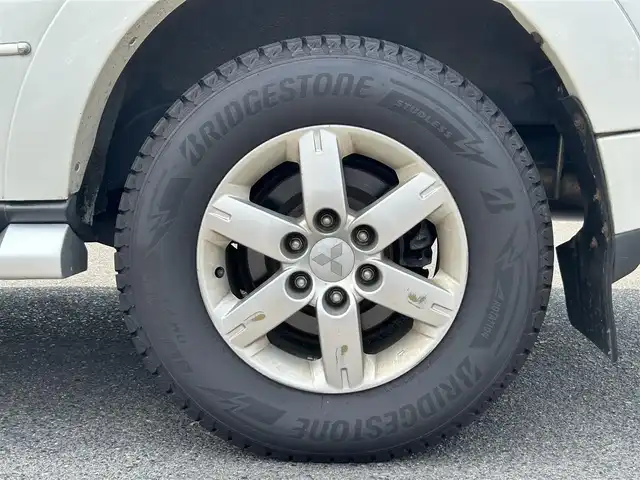 三菱 パジェロ ロング エクシード 広島県 2010(平22)年 17.4万km ウォームホワイトパール パートタイム4WD/社外ナビ/「CD/DVD/Bluetooth/フルセグTV」/SOREXヒッチメンバー/バックカメラ/シートヒーター/ETC/ドライブレコーダー/センターインフォメーションディスプレイ/オートライト/スペアキー