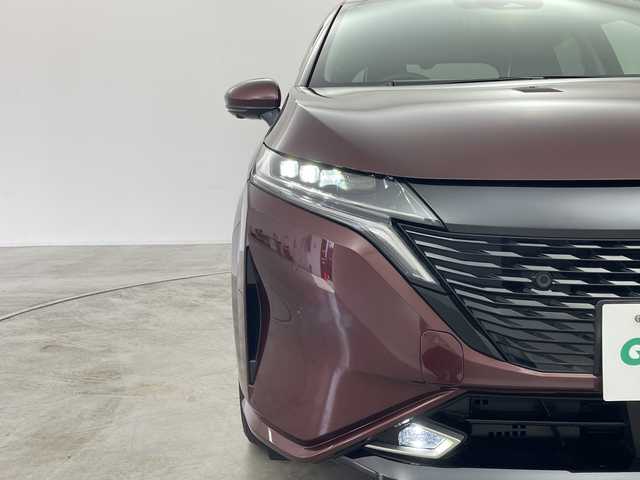 日産 オーラ G レザーエディション 群馬県 2024(令6)年 0.8万km バーガンディー BOSEパーソナルプラスサウンドシステム　純正9型ナビ　全周囲カメラ　衝突被害軽減ブレーキ　置くだけ充電　デジタルインナーミラー　ステアリングヒーター　アダプティブクルーズコントロール　LED　禁煙車