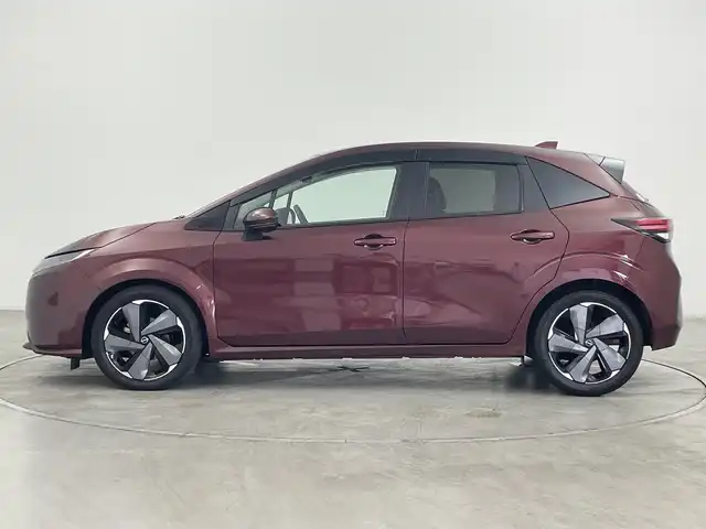 日産 オーラ G レザーエディション 群馬県 2024(令6)年 0.8万km バーガンディー BOSEパーソナルプラスサウンドシステム　純正9型ナビ　全周囲カメラ　衝突被害軽減ブレーキ　置くだけ充電　デジタルインナーミラー　ステアリングヒーター　アダプティブクルーズコントロール　LED　禁煙車