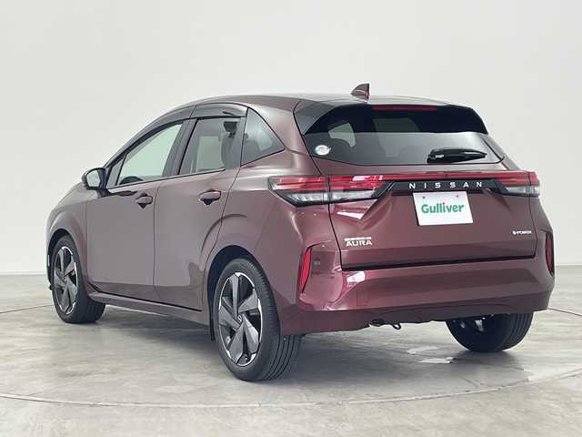 日産 オーラ G レザーエディション 群馬県 2024(令6)年 0.8万km バーガンディー BOSEパーソナルプラスサウンドシステム　純正9型ナビ　全周囲カメラ　衝突被害軽減ブレーキ　置くだけ充電　デジタルインナーミラー　ステアリングヒーター　アダプティブクルーズコントロール　LED　禁煙車