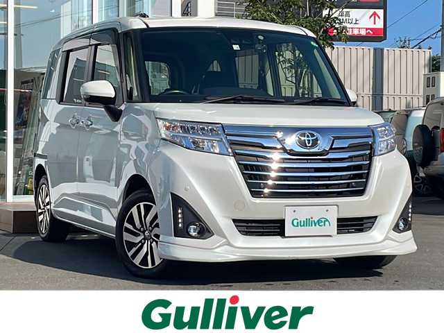 トヨタ ルーミー カスタムG 道央・札幌 2020(令2)年 8.3万km パールホワイトⅢ ・４WD/・純正SDナビ/　CD・SD・AUX・Bluetooth/・ワンセグTV/・バックカメラ/・衝突軽減ブレーキ/・レーンキープアシスト/・横滑り防止装置/・アイドリングストップ/・クルーズコントロール/・ビルトインETC/・前後ドライブレコーダー/・両側パワースライドドア/・LEDヘッドライト/・フォグランプ/・寒冷地仕様/・ドアバイザー/・プッシュスタート/・ウィンカーミラー/・スマートキー/・純正１４インチアルミホイール/・純正フロアマット/・取扱説明書/・スペアキー