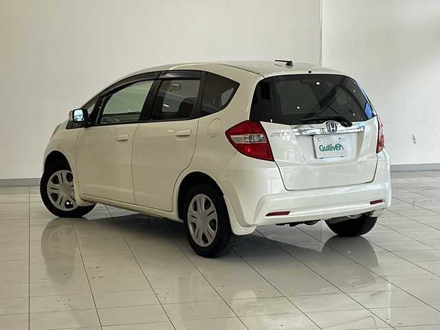 ホンダ フィット XH 新潟県 2012(平24)年 6.7万km プレミアムホワイトパール 4WD/純正インターナビ(VXM-128VSXi)/CD/DVD/USB/ワンセグテレビ/バックカメラ/ETC/クルーズコントロール/シートヒーター /ミラーヒーター/ステアリングスイッチ/スマートキー/キセノンヘッドライト/オートライト/社外15インチAW夏タイヤ車載