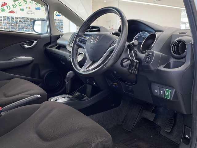 ホンダ フィット XH 新潟県 2012(平24)年 6.7万km プレミアムホワイトパール 4WD/純正インターナビ(VXM-128VSXi)/CD/DVD/USB/ワンセグテレビ/バックカメラ/ETC/クルーズコントロール/シートヒーター /ミラーヒーター/ステアリングスイッチ/スマートキー/キセノンヘッドライト/オートライト/社外15インチAW夏タイヤ車載