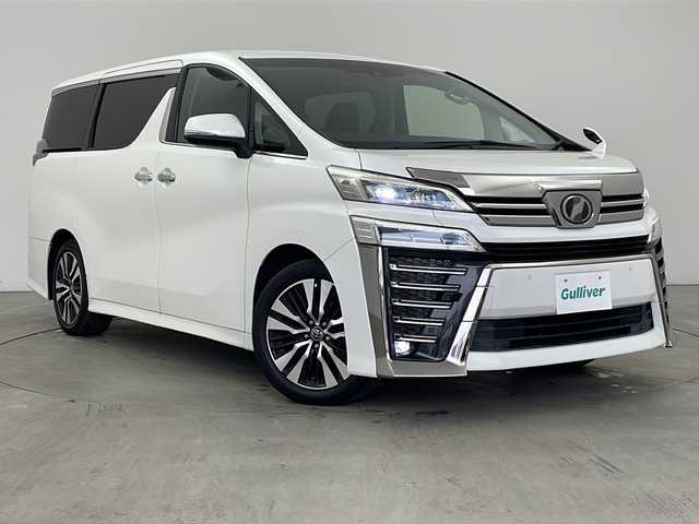 トヨタ ヴェルファイア Z Gエディション 兵庫県 2018(平30)年 7.8万km ホワイトパールクリスタルシャイン ・トヨタセーフティーセンス/・プリクラッシュセーフティ/・レーンディバチャーアラート/・パーキングサポートブレーキ/・クリアランスソナー/・ロードサインアシスト/・オートマチックハイビーム/・レーダークルーズコントロール/・先行車発進お知らせ/・アルパインナビ＆TV＆BT＆DVD＆SD&CD&HDMI/・アルパインフリップダウンモニター/・バックカメラ/・両側パワースライドドア/・前席シートヒーター/・前席ベンチレーション/・運転席メモリーシート/・前席パワーシート/・ステアリングヒーター/・デジタルインナーミラー/・ビルトインETC/・ウッドコンビハンドル/・AC100V電源/・スマートキー/・プッシュスタート/・パワーバックドア/・LEDヘッドライト/・LEDフォグランプ/・オートライト/・助手席オットマン/・2列目オットマン/・純正18インチアルミホイール