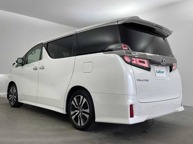 トヨタ ヴェルファイア Z Gエディション 兵庫県 2018(平30)年 7.8万km ホワイトパールクリスタルシャイン ・トヨタセーフティーセンス/・プリクラッシュセーフティ/・レーンディバチャーアラート/・パーキングサポートブレーキ/・クリアランスソナー/・ロードサインアシスト/・オートマチックハイビーム/・レーダークルーズコントロール/・先行車発進お知らせ/・アルパインナビ＆TV＆BT＆DVD＆SD&CD&HDMI/・アルパインフリップダウンモニター/・バックカメラ/・両側パワースライドドア/・前席シートヒーター/・前席ベンチレーション/・運転席メモリーシート/・前席パワーシート/・ステアリングヒーター/・デジタルインナーミラー/・ビルトインETC/・ウッドコンビハンドル/・AC100V電源/・スマートキー/・プッシュスタート/・パワーバックドア/・LEDヘッドライト/・LEDフォグランプ/・オートライト/・助手席オットマン/・2列目オットマン/・純正18インチアルミホイール