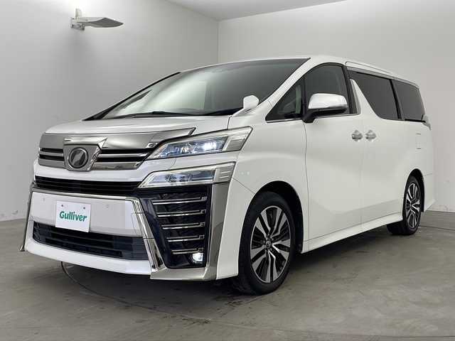 トヨタ ヴェルファイア Z Gエディション 兵庫県 2018(平30)年 7.8万km ホワイトパールクリスタルシャイン ・トヨタセーフティーセンス/・プリクラッシュセーフティ/・レーンディバチャーアラート/・パーキングサポートブレーキ/・クリアランスソナー/・ロードサインアシスト/・オートマチックハイビーム/・レーダークルーズコントロール/・先行車発進お知らせ/・アルパインナビ＆TV＆BT＆DVD＆SD&CD&HDMI/・アルパインフリップダウンモニター/・バックカメラ/・両側パワースライドドア/・前席シートヒーター/・前席ベンチレーション/・運転席メモリーシート/・前席パワーシート/・ステアリングヒーター/・デジタルインナーミラー/・ビルトインETC/・ウッドコンビハンドル/・AC100V電源/・スマートキー/・プッシュスタート/・パワーバックドア/・LEDヘッドライト/・LEDフォグランプ/・オートライト/・助手席オットマン/・2列目オットマン/・純正18インチアルミホイール