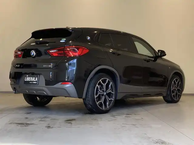 ＢＭＷ Ｘ２ sDrive18i MスポーツX 熊本県 2019(平31)年 4.5万km サファイアブラックP ２WD/純正ナビ/（BT/ライブラリ/USB）/インテリジェントセーフティ/ー衝突警告/ー歩行者警告/ー車線逸脱警告/ドライブレコーダー（前方）/革巻きステアリング/速度リミッター/MTモードAT/フロアマット/電動格納ミラーウィンカー/オートライト/オートワイパー/走行モードセレクト/ーSPORT/ーCOMFORT/ーECO PRO/パワーシート/シートヒーター/ETC2.0/LEDヘッドライト/LEDフォグライト