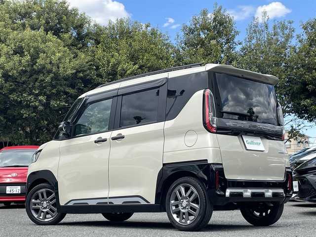 三菱 デリカミニ T プレミアム 埼玉県 2024(令6)年 1.5万km アイボリー 外部検査済み/ワンオーナー/社外9インチナビ（AVIC-RQ720）/・Bluetoothオーディオ/・フルセグTV/・CD/DVD/マルチアラウンドモニター/両側パワースライドドア/前席シートヒーター/ステアリングヒーター/デジタルルームミラー/前後ドライブレコーダー/e-Assist/・衝突被害軽減ブレーキシステム/・踏み間違い衝突防止アシスト/・車線逸脱警報アシスト/車線逸脱防止支援機構/・オートマチックハイビーム/・ふらつき警報/・前方衝突予測警報/・標識認識システム/・先行車発進通知/マイパイロット（高速道路同一車線運転支援機能）/・レーダークルーズコントロール/・車線維持支援機能/電動パーキングブレーキ/ブレーキオートホールド/リヤサーキュレーター（プラズマクラスター付）/パドルシフト/純正フロアマット/純正15インチAW/保証書/取扱説明書/スペアキー