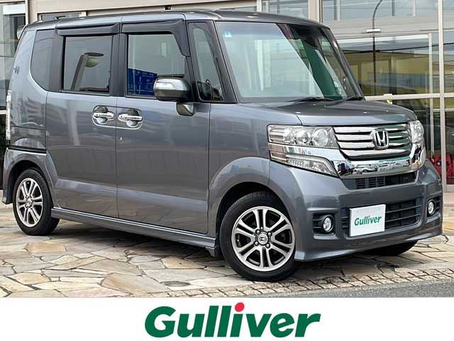 ホンダ Ｎ ＢＯＸ カスタム G ターボ Aパッケージ 静岡県 2014(平26)年 8.5万km ポリッシュドメタルメタリック 社外メモリナビ/・CD/・DVD/・Bluetooth/・フルセグTV/主要装備/・両側パワスラ/・クルコン/・バックカメラ/・ETC/・MTモード付/・前方ドラレコ/・純正フロアマット/・フォグランプ