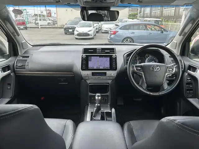 トヨタ ランドクルーザー プラド TX Lパッケージ 愛知県 2018(平30)年 8.3万km ホワイトパールクリスタルシャイン ワンオーナー/純正メモリナビ/フルセグテレビ/バックカメラ/アラウンドビュー/Bluetooth/ウィンカーミラー/クルーズコントロール/ドアバイザー/プッシュスタート/レザーステアリング/衝突軽減ブレーキ/レーンキープ/コーナーセンサー/シートヒーター