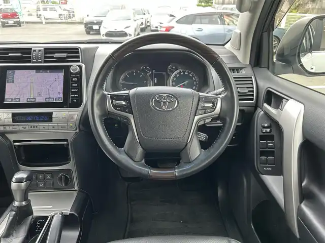 トヨタ ランドクルーザー プラド TX Lパッケージ 愛知県 2018(平30)年 8.3万km ホワイトパールクリスタルシャイン ワンオーナー/純正メモリナビ/フルセグテレビ/バックカメラ/アラウンドビュー/Bluetooth/ウィンカーミラー/クルーズコントロール/ドアバイザー/プッシュスタート/レザーステアリング/衝突軽減ブレーキ/レーンキープ/コーナーセンサー/シートヒーター