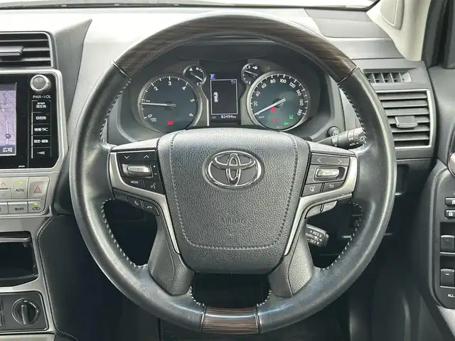 トヨタ ランドクルーザー プラド TX Lパッケージ 愛知県 2018(平30)年 8.3万km ホワイトパールクリスタルシャイン ワンオーナー/純正メモリナビ/フルセグテレビ/バックカメラ/アラウンドビュー/Bluetooth/ウィンカーミラー/クルーズコントロール/ドアバイザー/プッシュスタート/レザーステアリング/衝突軽減ブレーキ/レーンキープ/コーナーセンサー/シートヒーター