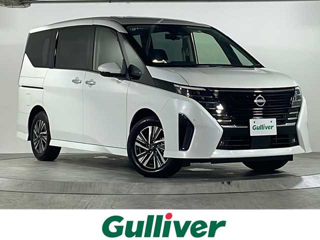 日産 セレナ e－パワー ハイウェイスター V 広島県 2025(令7)年 0.1千km プリズムホワイト 禁煙/アラウンドビューモニター/インテリジェントインナーミラー/LEDオートライト/エマージェンシーブレーキ/横滑り防止装置/車線維持支援/標識検知支援/ハイビームアシスト/BSW/コーナーセンサー/プロパイロット/純正12.3型メモリナビ/（AM/FM/BT/フルセグTV/HDMI/USB）/ワイヤレス充電/ステアリングスイッチ/ハンズフリー両側パワースライドドア/電動パーキングブレーキ/オートホールド/ウォークスルー/スマートキー/プッシュスタートボタン/スペアキー/純正１６インチアルミホイール/ETC