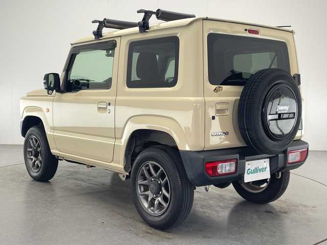 スズキ ジムニー XC 宮崎県 2019(令1)年 7万km シフォンアイボリーM 禁煙車/衝突被害軽減ブレーキ/純正8型ナビTV/（CN-RZ843/CD/DVD/Bluetooth/フルセグTV)/純正バックカメラ/純正LEDオートライト/純正フォグ/純正16インチアルミ/純正ラバーマット/クルーズコントロール/ダウンヒルアシストコントロール/オートマチックハイビーム/レーンディパーチャーアラート/前席シートヒーター/オートエアコン/ウインカードアミラー/本革巻ハンドル/スマートキー/プッシュエンジンスタート/スペアキー/新車時保証書/取扱い説明書