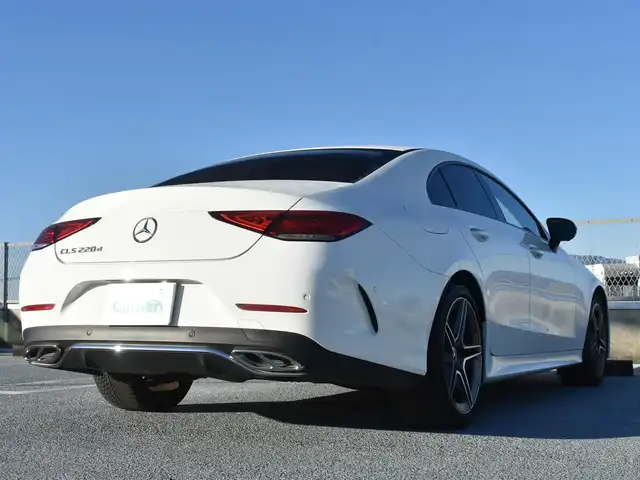 メルセデス・ベンツ ＣＬＳ２２０ｄ スポーツ エクスクルーシブPKG 神奈川県 2018(平30)年 4万km ポーラホワイト  スポーツエクスクルーシブパッケージ /サンルーフ/パヒュームアトマイザー/Burmesterサラウンドサウンドシステム13スピーカー/ナッパ革シート/：レッド/ブラックツートン/：前席パワーシート/：前席シートヒーター/ベンチレーション/：リアシートシートヒーター/マルチビームLEDヘッドランプ/ハイビームアシスト/社外デジタルミラー型ドライブレコーダー/革巻きステアリングホイール/：パドルシフト/12.3インチコックピットディスプレイ/コマンドシステム/メルデセスミーコネクト/：地デジ/：Bluetooth/：USB連動/全周囲カメラ/レーダーセーフティーパッケージ/：ディスタンスアシストディストロニック/：ステアリングアシスト（レーンチェンジアシスト）/：ブラインドスポットモニター/：レーンキープ/：ブレーキアシスト/：サインアシスト/ヘッドアップディスプレイ/電動ーリアゲート/スマートキー2個/ーーーーーーーーーーーーーー/保証書/取説/記録簿R1.2.3.4.5.6