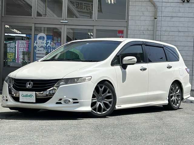 ホンダ オデッセイ アブソルート 岩手県 2009(平21)年 8.8万km プレミアムホワイトパール 純正ＨＤＤインターナビ　/全方位カメラ　/ローダウン　/キーレス　/ハーフレザーシート　/社外エンジンスターター　/フロントワイパーデアイサー/横滑り防止装置　/フルセグＴＶ　/革巻きステアリング　/パドルシフト /オートライト/フォグランプ/電動格納ミラー/ドアバイザー/フロアマット/USBソケット/VIDEOインプットソケット/保証書 取説ナビ取説