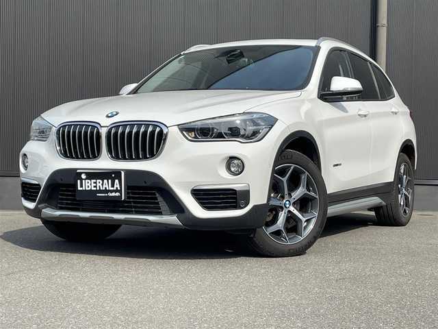 ＢＭＷ Ｘ１ sDrive 18i Xライン 香川県 2016(平28)年 12.2万km アルピンホワイトⅢ ワンオーナー/スマートキー/衝突軽減/レーンアシスト/保証書/取扱説明書/アイドリングストップ/純正ナビ/cd/dvd/bt/usb/aux/フルセグTV/バックカメラ/パワーシート/シートヒーター/ブラックレザーシート/サンルーフ/パワーバックドア/純正18インチアルミ/コーナーセンサー/フォグランプ/ウィンカーミラー/ルーフレール/オートライト/オートワイパー/革巻きステアリング
