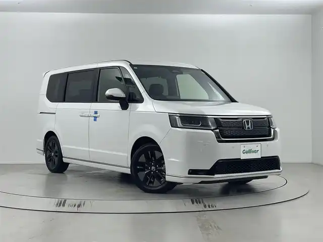 ホンダ ステップワゴン スパーダ eHEV 埼玉県 2025(令7)年 0.1万km未満 プラチナムホワイトパール 登録済未使用車/ホンダセンシング/純正11.4インチナビ/Bluetooth/フルセグ/両側パワースライドドア/バックカメラ/クルーズコントロール/ハーフレザーシート/前席シートヒーター/パドルシフト/純正16インチAW/プッシュスタート/スマートキー/スペアキー1本