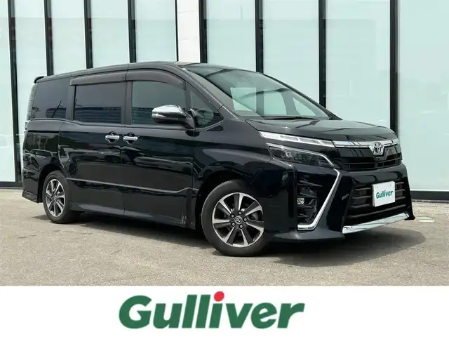 トヨタ ヴォクシー ZS 煌Ⅱ 大阪府 2020(令2)年 1.9万km ブラック 純正１０インチナビ/  フルセグTV/CD/DVD/Bluetooth/USB/バックモニター/衝突軽減ブレーキ/横滑り防止装置/コーナーセンサー/両側パワースライドドア/クルーズコントロール/ステアリングスイッチ/アイドリングストップ/ドライブレコーダー/オートマチックハイビーム/ハーフレザーシート/純正16インチアルミホイール/プッシュスタート/スマートキー/ＥＴＣ/ＬＥＤライト
