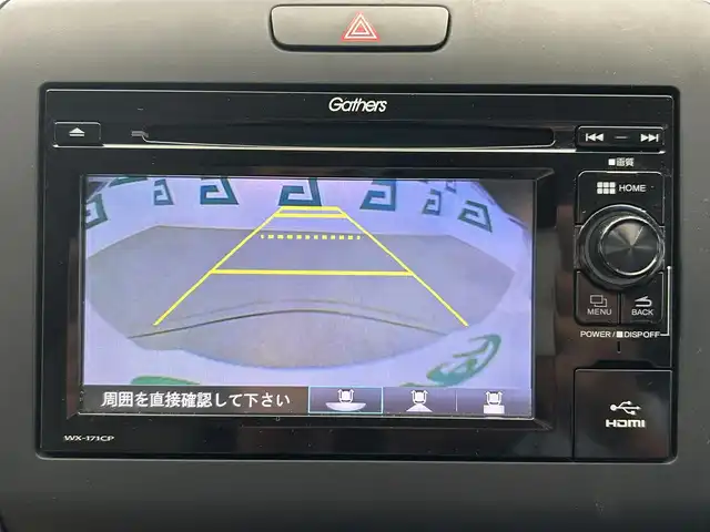 ホンダ フリード ハイブリット G ホンダセンシング 鹿児島県 2019(平31)年 5.4万km ホワイトオーキッドパール ワンオーナー　/禁煙車　/両側パワスラ　/純正ディスプレイオーディオ　/バックカメラ　/ワンセグＴＶ　/Ｂｌｕｅｔｏｏｔｈ　/ホンダセンシング　/追従型クルコン　/電格ミラー　/前席レザー調シートカバー　/ステリモ　/ＥＴＣ/ドアバイザー/後席ロール式サンシェード/純正フロアマット/スマートキー