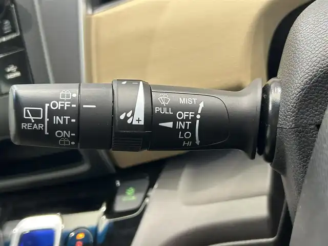 ホンダ フリード ハイブリット G ホンダセンシング 鹿児島県 2019(平31)年 5.4万km ホワイトオーキッドパール ワンオーナー　/禁煙車　/両側パワスラ　/純正ディスプレイオーディオ　/バックカメラ　/ワンセグＴＶ　/Ｂｌｕｅｔｏｏｔｈ　/ホンダセンシング　/追従型クルコン　/電格ミラー　/前席レザー調シートカバー　/ステリモ　/ＥＴＣ/ドアバイザー/後席ロール式サンシェード/純正フロアマット/スマートキー