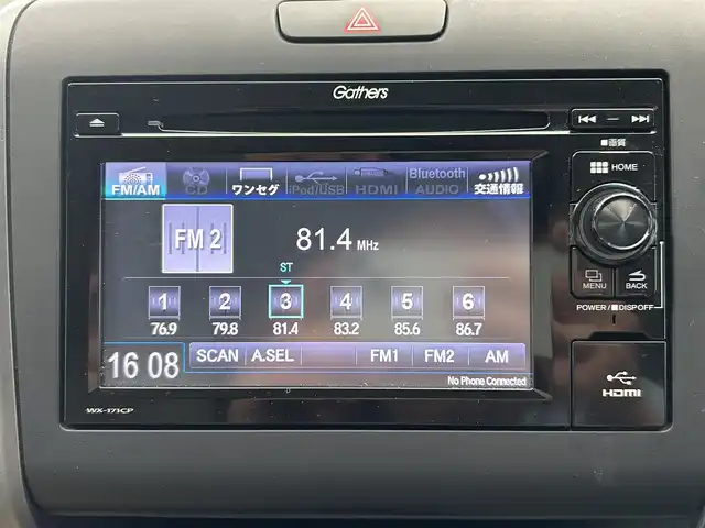 ホンダ フリード ハイブリット G ホンダセンシング 鹿児島県 2019(平31)年 5.4万km ホワイトオーキッドパール ワンオーナー　/禁煙車　/両側パワスラ　/純正ディスプレイオーディオ　/バックカメラ　/ワンセグＴＶ　/Ｂｌｕｅｔｏｏｔｈ　/ホンダセンシング　/追従型クルコン　/電格ミラー　/前席レザー調シートカバー　/ステリモ　/ＥＴＣ/ドアバイザー/後席ロール式サンシェード/純正フロアマット/スマートキー