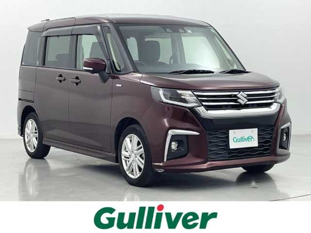 スズキ ソリオ HV MZ 熊本県 2020(令2)年 4.8万km メロウディープレッドパール 純正9インチナビ（ＣＤ・ＤＶＤ・フルセグ・ＢＴ・ＵＳＢ）/全周囲カメラ/両側パワースライドドア　/前席シートヒーター　/後ろのみクリアランスソナー　/レーダークルーズコントロール　/衝突軽減ブレーキ　/レーンキープアシスト/横滑り防止/アイドリングストップ/ヘッドアップディスプレイ/スリムサーキュレーター/パーソナルテーブル/純正フロアマット/純正１５インチAW/オートライト/LEDヘッドライト/フォグランプ/スマートキー/プッシュスタート