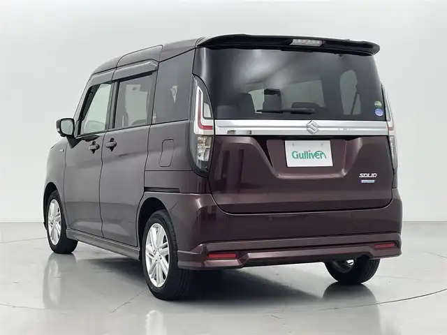 スズキ ソリオ HV MZ 熊本県 2020(令2)年 4.8万km メロウディープレッドパール 純正9インチナビ（ＣＤ・ＤＶＤ・フルセグ・ＢＴ・ＵＳＢ）/全周囲カメラ/両側パワースライドドア　/前席シートヒーター　/後ろのみクリアランスソナー　/レーダークルーズコントロール　/衝突軽減ブレーキ　/レーンキープアシスト/横滑り防止/アイドリングストップ/ヘッドアップディスプレイ/スリムサーキュレーター/パーソナルテーブル/純正フロアマット/純正１５インチAW/オートライト/LEDヘッドライト/フォグランプ/スマートキー/プッシュスタート