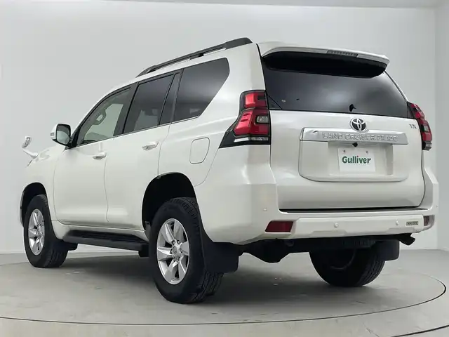トヨタ ランドクルーザー プラド TX Lパッケージ 熊本県 2022(令4)年 6.5万km ホワイトパールクリスタルシャイン 純正SDナビ(フルセグTV/CD/DVD/BT/FM/AM)/サンルーフ/バックカメラ/トヨタセーフティセンス/・プリクラッシュセーフティ/・レーンディパーチャアラート/・クリアランスソナー/・ロードサインアシスト/・オートマチックハイビーム/・レーダークルーズコントロール/革シート/前席パワーシート/前席シートヒーター/前席シートクーラー/ステアリングリモコン/ビルトインETC/センターデフロック/純正フロアマット/スペアキー