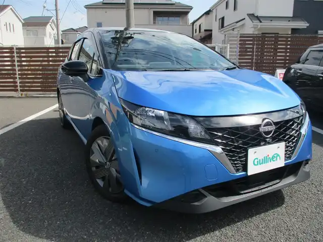 日産 ノート X 千葉県 2021(令3)年 0.6万km 青Ⅱ 社外ディスプレイオーディオ/バックカメラ/前後ドライブレコーダー/ETC/エマージェンシーブレーキ/ハイビームアシスト/フロント/バックソナー/イモビライザー/IRカット&スーパーUVカット断熱グリーンガラス/プッシュスタート/スマートキー2本/サイドエアバッグ/ニーエアバッグ/カーテンエアバッグ/保証書/取扱説明書