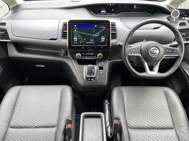 日産 セレナ e－パワー ハイウェイスター V 宮城県 2021(令3)年 2.6万km ダークメタルグレー/ダイヤモンドブラック プロパイロット/エマージェンシーブレーキ/側方支援/ブラインドスポットモニター/デジタルインナーミラー/全周囲カメラ/純正10インチSDナビ/・BT.CD.DVD.SD.USB.HDMI.ブルーレイ/フルセグTV/純正フリップダウンモニター/両側パワースライドドア/ハンズフリースライドドア/合皮シート/前席シートヒーター/ステアリングヒーター/ステアリングスイッチ/プッシュスタート/スマートキー×2/ETC/ドライブレコーダー（F）/電動パーキングブレーキ/LEDヘッドライト/LEDフォグライト/純正フロアマット/純正15インチAW/ロールサンシェード/シートバックテーブル/ドアバイザー