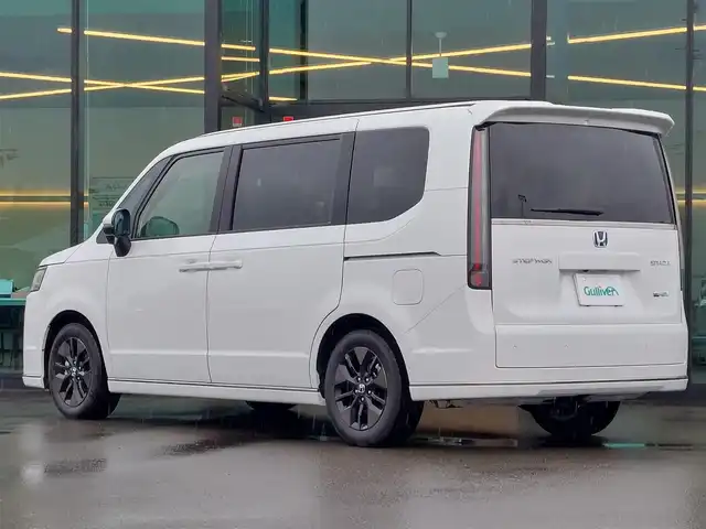 ホンダ ステップワゴン スパーダ eHEV 東京都 2025(令7)年 0.1万km未満 プラチナホワイトパール 登録済未使用車/純正11.4インチナビ/フルセグTV/CD/DVD/Bluetooth/両側パワースライドドア/バックカメラ/前席シートヒーター/ハーフレザーシート/純正アルミホイール/ホンダセンシング/衝突軽減ブレーキシステム/レーダークルーズコントロール/レーンキープアシストシステム/パドルシフト/オートハイビーム/パワーバックドア/2列目オットマン