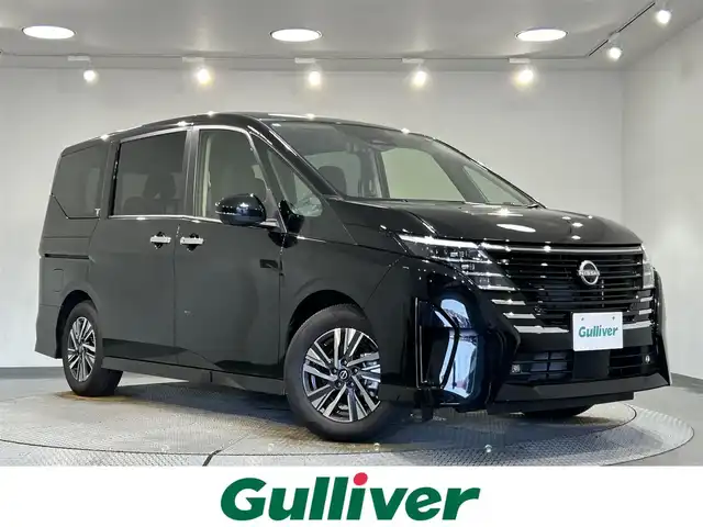 日産 セレナ ハイウェイスター V 愛知県 2023(令5)年 0.8万km ダイヤモンドブラック 純正１２．３インチディスプレイ/プロパイロット/アラウンドビューモニター/フリップダウンモニター/両側パワースライドドア/パドルシフト/ワイヤレス充電/デジタルインナーミラー/ビルトインETC2.0/USB入力端子/衝突軽減ブレーキ/ブラインドスポットモニター/車線逸脱警報/クリアランスソナー/踏み間違え防止システム/純正16インチアルミホイール/純正フロアマット