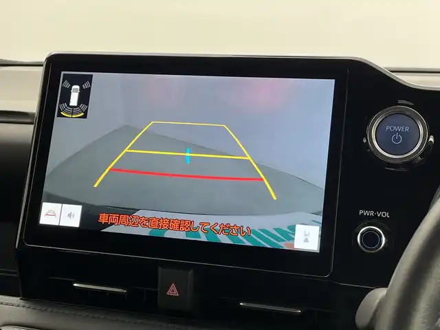 トヨタ ヴォクシー ハイブリッド S－Z 新潟県 2023(令5)年 1.4万km グリッターブラックガラスフレーク 10.5インチ純正メモリナビ/　フルセグTV/Bluetooth/CD/DVD/USB/レーダークルーズコントロール/衝突被害軽減ブレーキ/レーンキープアシスト/前後コーナーセンサー/両側パワースライドドア/ハーフレザーシート/前席シートヒーター/バックモニター/ビルトインETC/横滑り防止装置/LEDヘッドライト/オートマチックハイビーム/オートライト/ユニバーサルステップ/レザーステアリング/ステアリングスイッチ/禁煙車