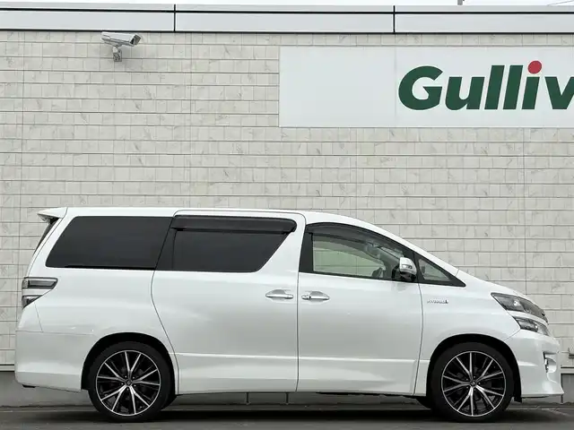 トヨタ ヴェルファイア ハイブリット ZR Gエディション 岩手県 2012(平24)年 8.8万km ホワイトパールクリスタルシャイン 4WD/ツインサンルーフ/フリップダウンモニター/全方位カメラ/両側パワースライドドア/クルーズコントロール/黒革シート/AC100V電源/純正ナビ/→フルセグTV/Bluetooth/FM/AM/ステアリングスイッチ/バックカメラ/アダプティブフロントライティングシステム/シートヒーター/パワーシート/〇プッシュスタート/〇電動格納ミラー/〇ドアバイザー/〇フロアマット/〇シガーソケット/〇スマートキー/オットマン/ETC/冬タイヤ純正アルミ車載