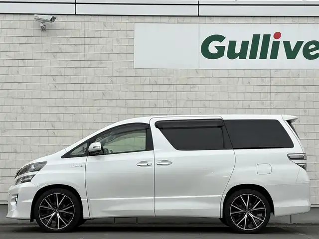 トヨタ ヴェルファイア ハイブリット ZR Gエディション 岩手県 2012(平24)年 8.8万km ホワイトパールクリスタルシャイン 4WD/ツインサンルーフ/フリップダウンモニター/全方位カメラ/両側パワースライドドア/クルーズコントロール/黒革シート/AC100V電源/純正ナビ/→フルセグTV/Bluetooth/FM/AM/ステアリングスイッチ/バックカメラ/アダプティブフロントライティングシステム/シートヒーター/パワーシート/〇プッシュスタート/〇電動格納ミラー/〇ドアバイザー/〇フロアマット/〇シガーソケット/〇スマートキー/オットマン/ETC/冬タイヤ純正アルミ車載