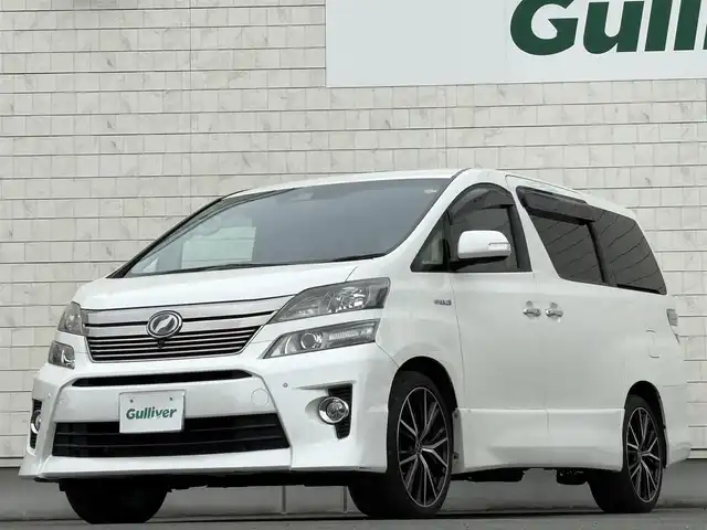 トヨタ ヴェルファイア ハイブリット ZR Gエディション 岩手県 2012(平24)年 8.8万km ホワイトパールクリスタルシャイン 4WD/ツインサンルーフ/フリップダウンモニター/全方位カメラ/両側パワースライドドア/クルーズコントロール/黒革シート/AC100V電源/純正ナビ/→フルセグTV/Bluetooth/FM/AM/ステアリングスイッチ/バックカメラ/アダプティブフロントライティングシステム/シートヒーター/パワーシート/〇プッシュスタート/〇電動格納ミラー/〇ドアバイザー/〇フロアマット/〇シガーソケット/〇スマートキー/オットマン/ETC/冬タイヤ純正アルミ車載