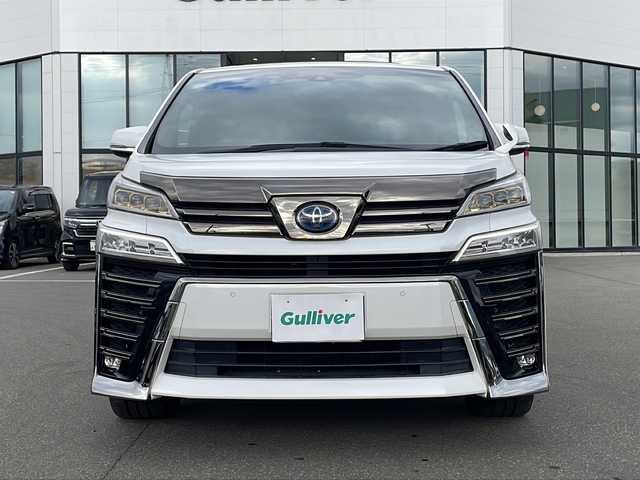 トヨタ ヴェルファイア ハイブリット Z ゴールデンアイズ 青森県 2020(令2)年 6.2万km ホワイトパールクリスタルシャイン ・4WD/・サンルーフ/・純正メーカーOPナビ/・フリップダウンモニター/・フルセグ/CD/DVD/BT/・両側パワースライドドア/・衝突軽減ブレーキ/・レーンキープアシスト/・レーダークルーズコントロール/・盗難防止装置/・前後コーナーセンサー/・ドライブレコーダー/・プッシュスタート/・スマートキー/・純正フロアマット/・オートライト/・オートマチックハイビーム/・LEDヘッドライト/・ハーフレザーシート/・社外18AW/・保証書・取説あり
