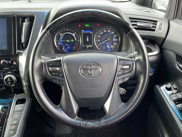 トヨタ ヴェルファイア ハイブリット Z ゴールデンアイズ 青森県 2020(令2)年 6.2万km ホワイトパールクリスタルシャイン ・4WD/・サンルーフ/・純正メーカーOPナビ/・フリップダウンモニター/・フルセグ/CD/DVD/BT/・両側パワースライドドア/・衝突軽減ブレーキ/・レーンキープアシスト/・レーダークルーズコントロール/・盗難防止装置/・前後コーナーセンサー/・ドライブレコーダー/・プッシュスタート/・スマートキー/・純正フロアマット/・オートライト/・オートマチックハイビーム/・LEDヘッドライト/・ハーフレザーシート/・社外18AW/・保証書・取説あり