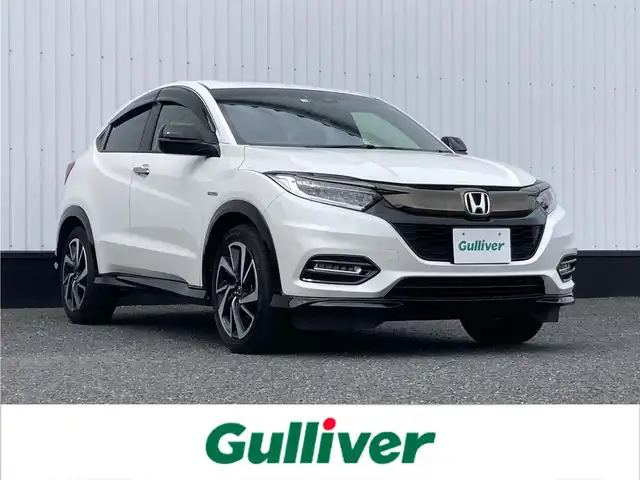 ホンダ ヴェゼル ハイブリッド RS ホンダセンシング 千葉県 2020(令2)年 3.4万km プラチナホワイトパール 純正8インチメモリナビ/(フルセグTV/BT/CD/DVD/FM/AM/HDMI)/バックカメラ/ドライブレコーダー/衝突被害軽減システム/車線逸脱警報/クルーズコントロール/ハーフレザーシート/横滑り防止装置/ETC/アイドリングストップ/LEDヘッドライト/フォグランプ/オートライト/ウィンカーミラー/電動格納ミラー/純正18インチAW/シートヒーター/シートリフター/プッシュスタート/スマートキー/フロアマット/ドアバイザー/スペアキー/取扱説明書
