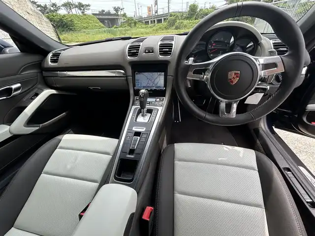 ポルシェ ボクスター 長崎県 2013(平25)年 2.7万km ダークブルーメタリック 社外メモリナビ/（フルセグ/CD/DVD/BT）/バックカメラ/レザーシート/パワーシート/シートヒーター/パドルシフト/ETC/オートライト/横滑り防止装置/電格ミラー/純正18インチAW/スペアキー/アイドリングストップ/取扱説明書/保証書