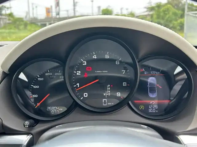 ポルシェ ボクスター 長崎県 2013(平25)年 2.7万km ダークブルーメタリック 社外メモリナビ/（フルセグ/CD/DVD/BT）/バックカメラ/レザーシート/パワーシート/シートヒーター/パドルシフト/ETC/オートライト/横滑り防止装置/電格ミラー/純正18インチAW/スペアキー/アイドリングストップ/取扱説明書/保証書