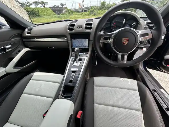 ポルシェ ボクスター 長崎県 2013(平25)年 2.7万km ダークブルーメタリック 社外メモリナビ/（フルセグ/CD/DVD/BT）/バックカメラ/レザーシート/パワーシート/シートヒーター/パドルシフト/ETC/オートライト/横滑り防止装置/電格ミラー/純正18インチAW/スペアキー/アイドリングストップ/取扱説明書/保証書